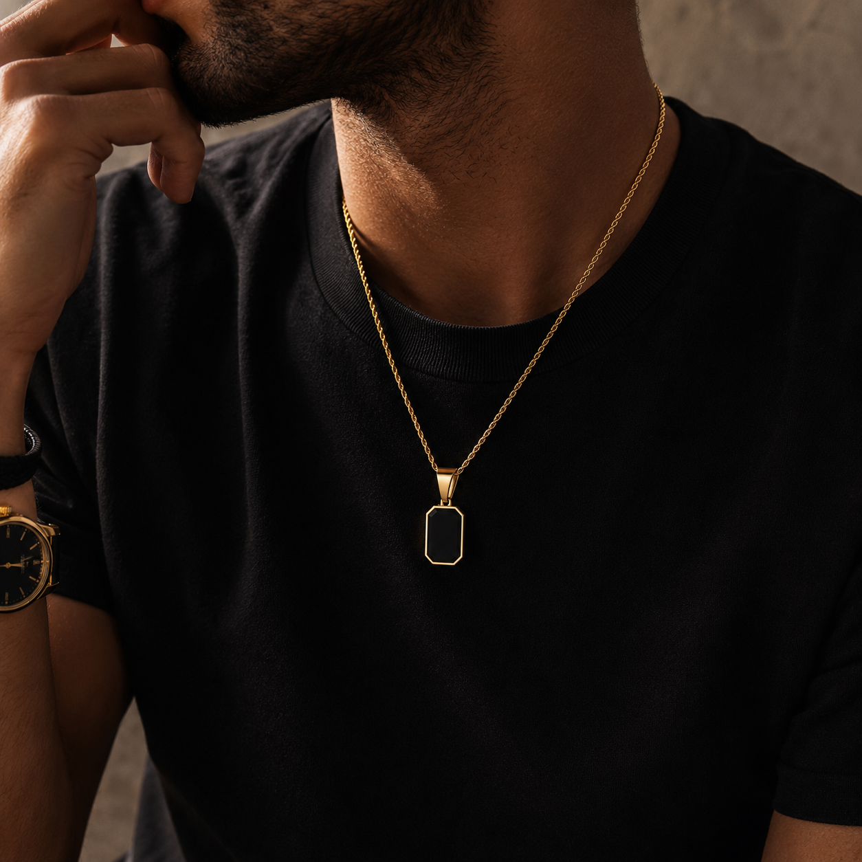 Aurex Necklace featuring a black geometric pendant with premium gold and silver finishes, luxury men's jewelry by Vyro.