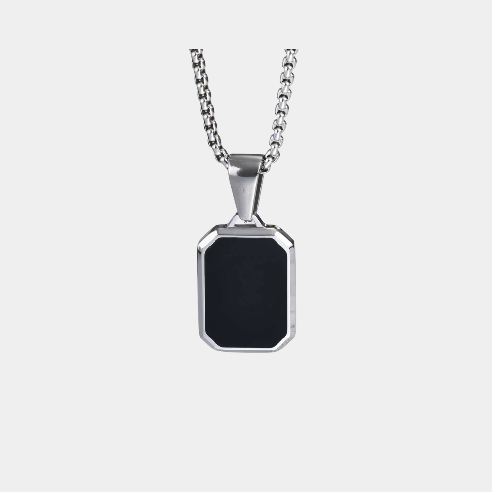 Aurex Necklace featuring a black geometric pendant with premium gold and silver finishes, luxury men's jewelry by Vyro.