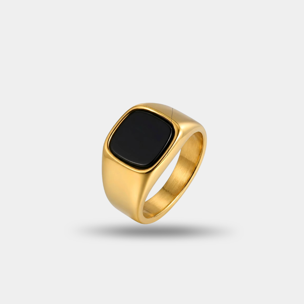 Modern man wearing the Noctis Ring black signet ring by Vyro gold